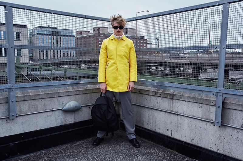 Arvid wears jacket Brixtol Textiles, sweater Boomerang, pants NAND, bag Eastpak x Raf Simons, sunglasses Ace & Tate, and shoes R.M. Williams.