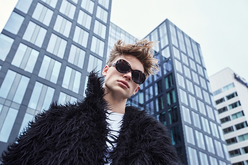 Ludvig wears jacket PRLE, t-shirt Axel Backlund, and sunglasses Ace & Tate.