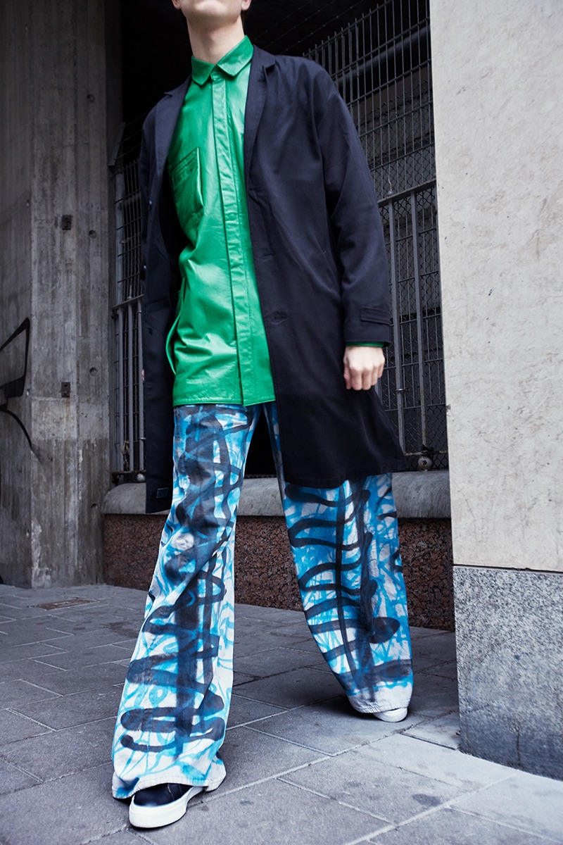 Kasper wears coat Brixtol Textiles, shirt NAND, pants Axel Backlund, and shoes Superga.