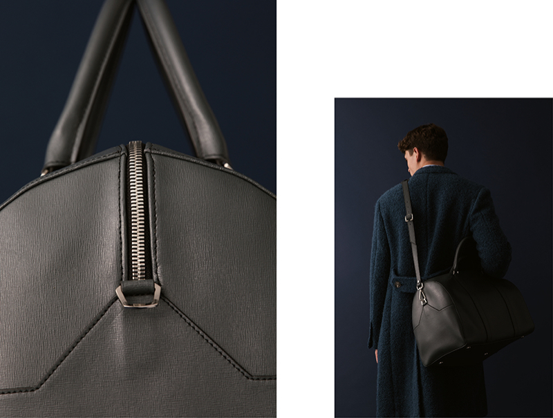 Charlie takes hold of a sleek leather carryall from Canali.