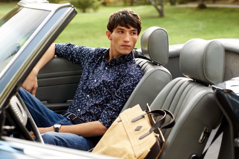 Ready for a weekend getaway, Jester White wears a patterned shirt and jeans from GANT.