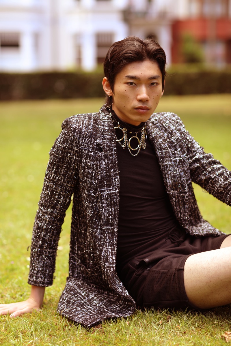 Hidetatsu wears choker Kali Theaa, top Hugo Boss, shorts Prada, and blazer Topman.