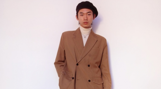 Hidetatsu Takeuchi in 'New in Town' Hidetatsu wears beret SCHA, suit jacket Gentle x Cover, turtleneck Calvin Klein, necklace XU Harajuku, jeans MISBHV, and boots Dries Van Noten.