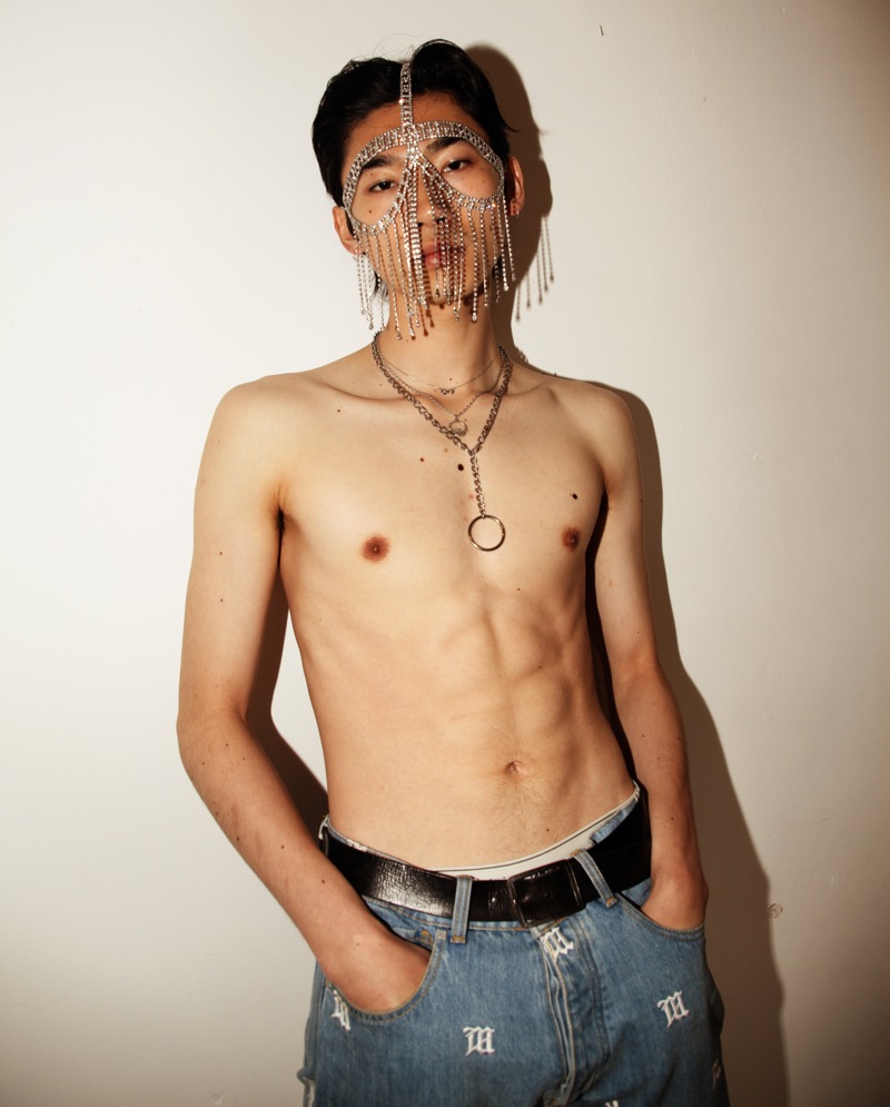 Hidetatsu wears belt Diesel, jeans MSBHV, face jewelry and necklace PRTTYBOI.