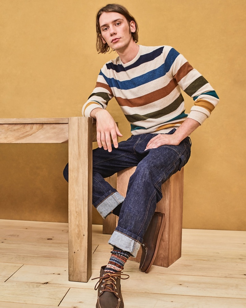 Making a case for color, Luca Bertea wears a J.Crew striped sweater $128, Wallace & Barnes carpenter jeans in Japanese rinsed indigo denim $148.