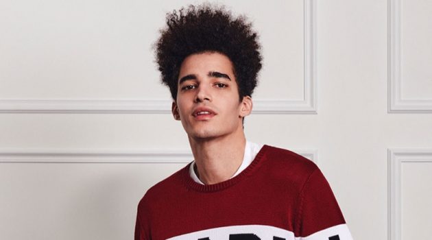 Front and center, Luis Borges wears a Karl Lagerfeld logo knit.