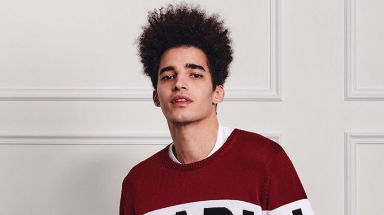 Front and center, Luis Borges wears a Karl Lagerfeld logo knit.