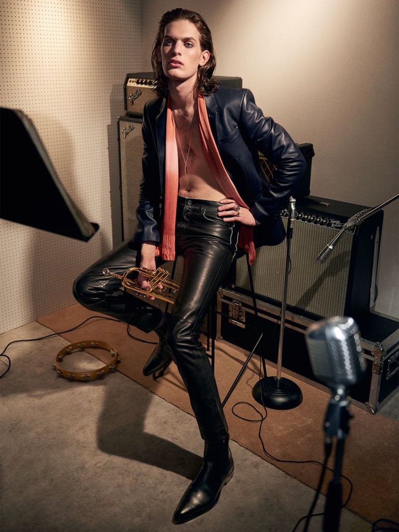 Lorenzo wears BERLUTI jacket £5,050 and trousers from a selection; scarf, stylist’s own; STEPHEN WEBSTER necklace £6,800 and ring (top) £1,450; ring (bottom), model’s own; GIVENCHY boots from a selection