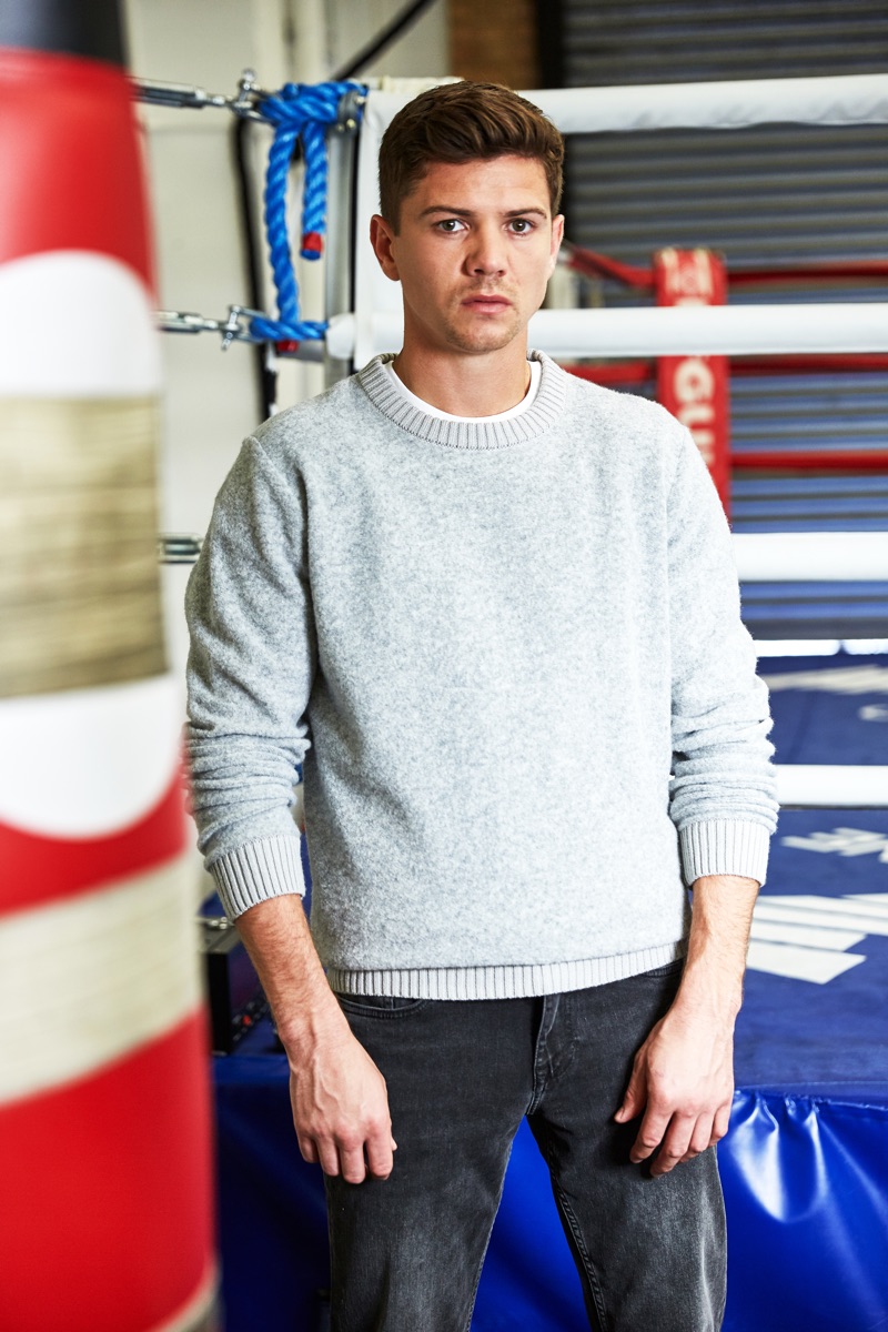 Olympic boxer Luke Campbell sports a crewneck sweater with distressed denim jeans from Ben Sherman.