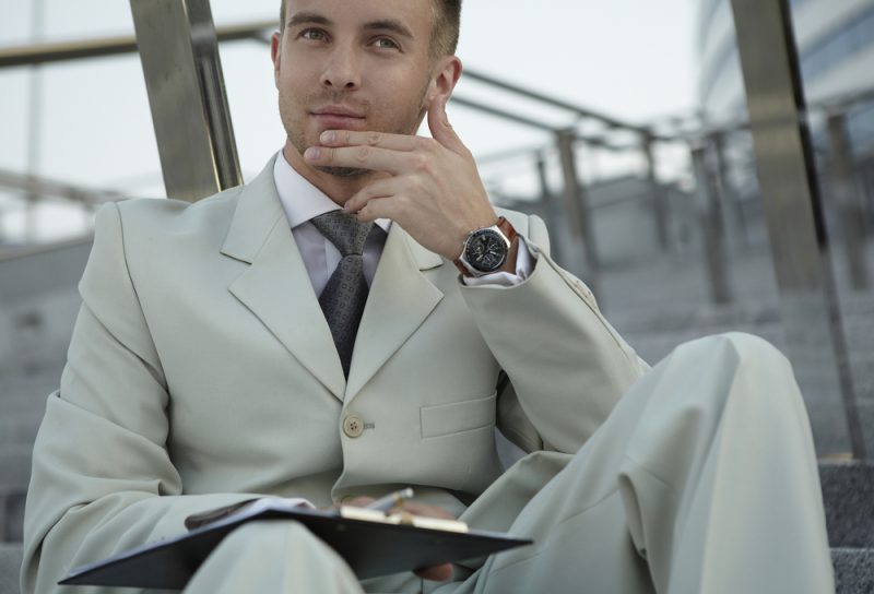 Man Neutral Suit Wearing Watch