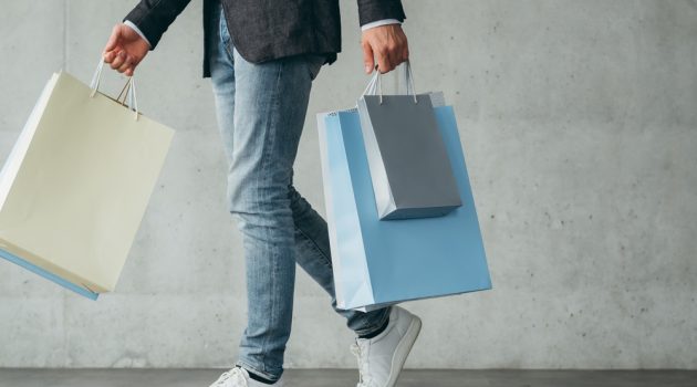 How to Make the Most of Your Next Shopping Trip Man with Shopping Bags