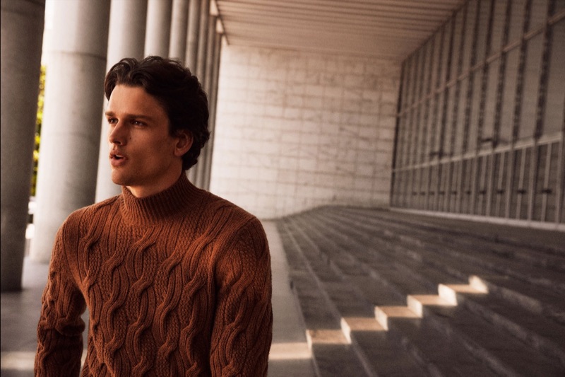 Donning a cable-knit sweater, Simon Nessman fronts Massimo Dutti's fall-winter 2019 campaign.