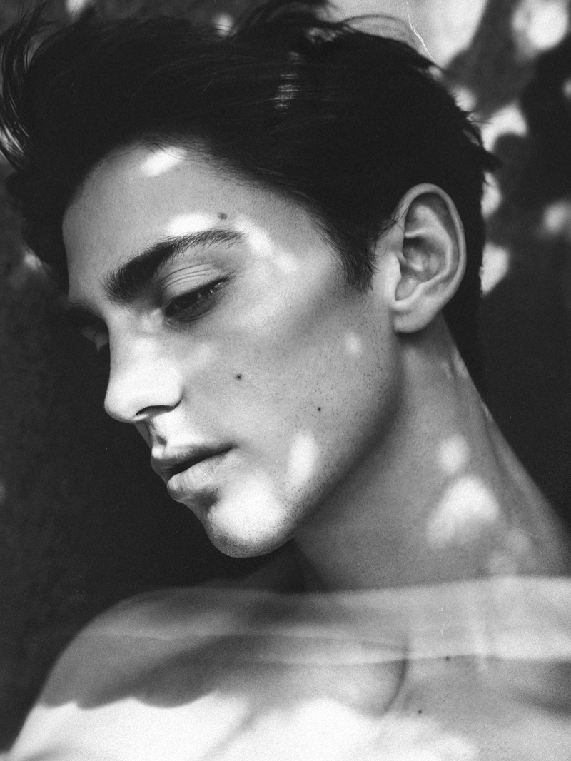 Matteo Miccini poses for a black and white photo lensed by Christian Oita.