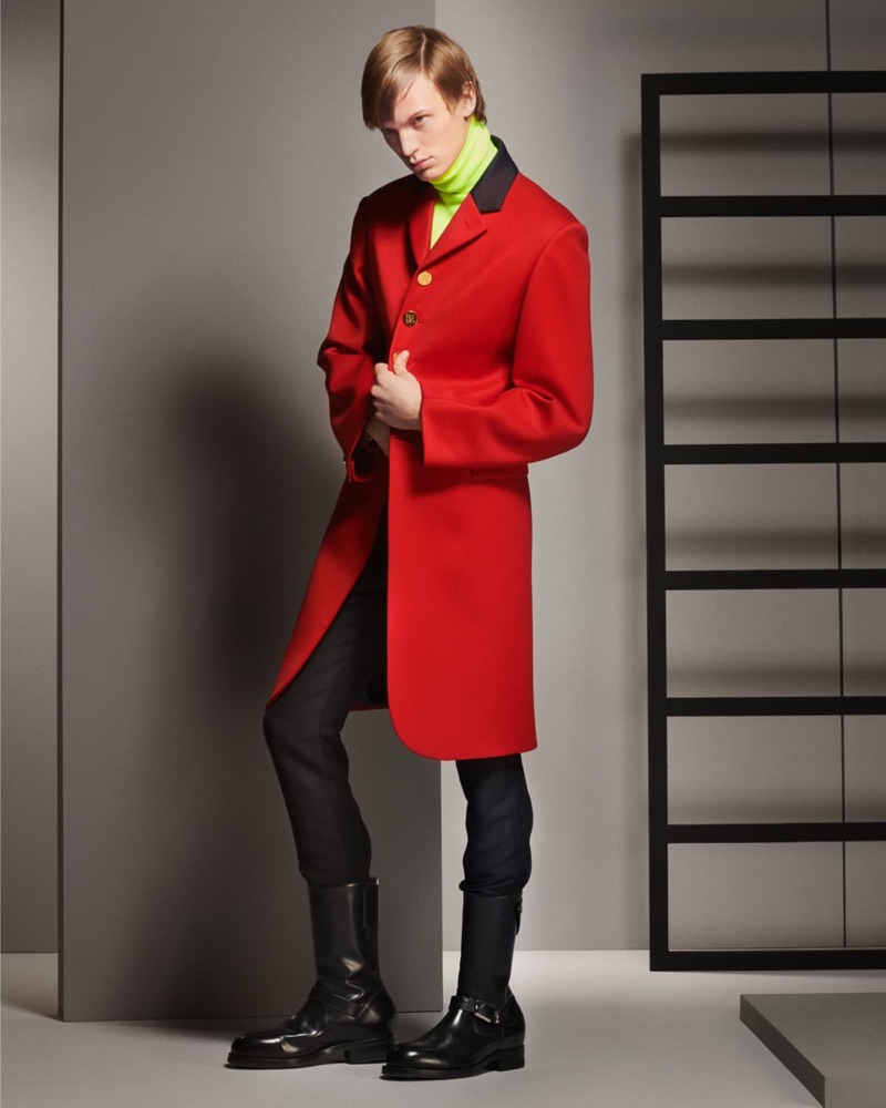 Donning a red coat, Jonas Glöer stars in Paul Smith's fall-winter 2019 men's campaign.