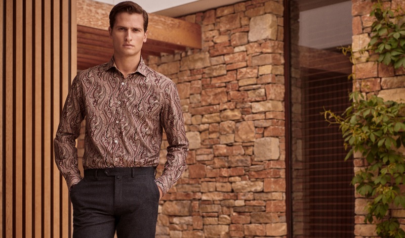 Modeling a paisley print shirt, Tom Warren appears in an image for Pedro del Hierro.