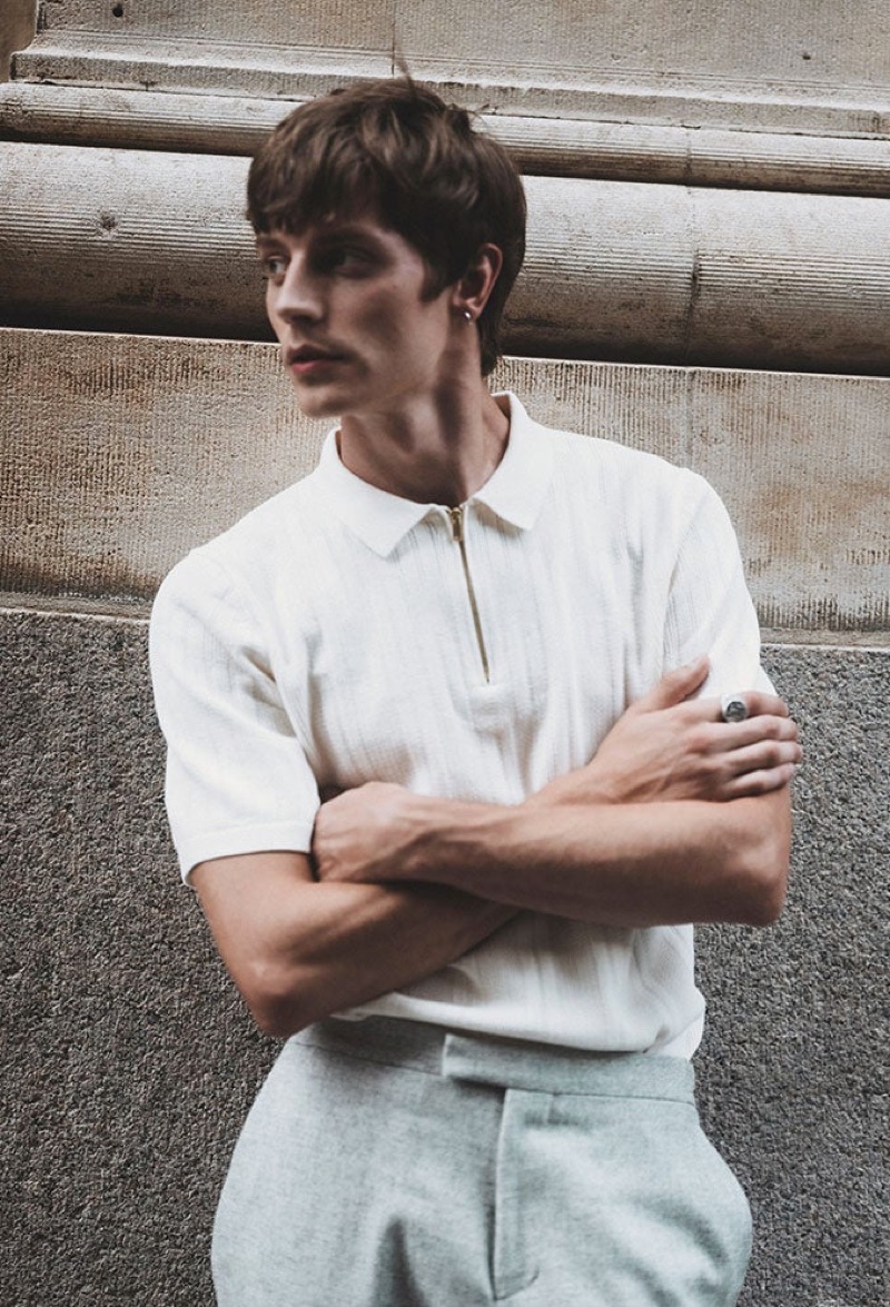 Donning a zippered polo shirt, Janis Ancens wears Reiss.