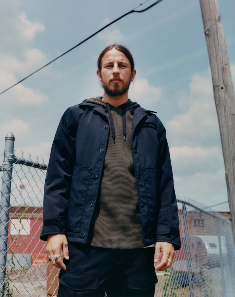 Layering, Riley Hawk wears a two-tone waffle hoodie $275 underneath a lightweight jacket.