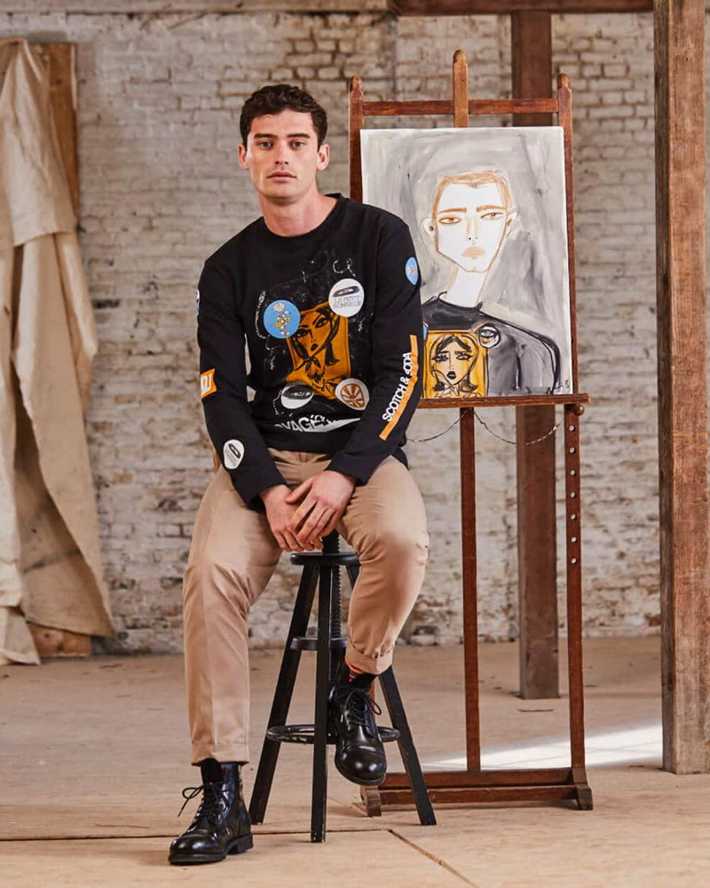 Model Harrison Griffiths sports a long-sleeve tee from Scotch & Soda's Blair Breitenstein collaboration.