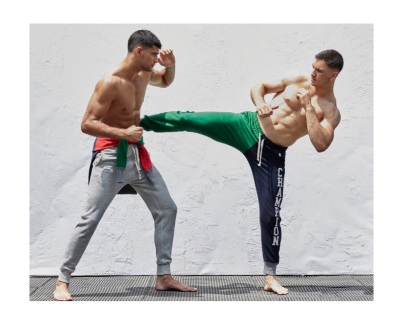 Judokas Jaad and Ismail Belgaid show off their moves in Todd Snyder + Champion. Pictured left, Jaad wears the brand's fleece joggers $118 in grey. Ismail rocks color block joggers $148.