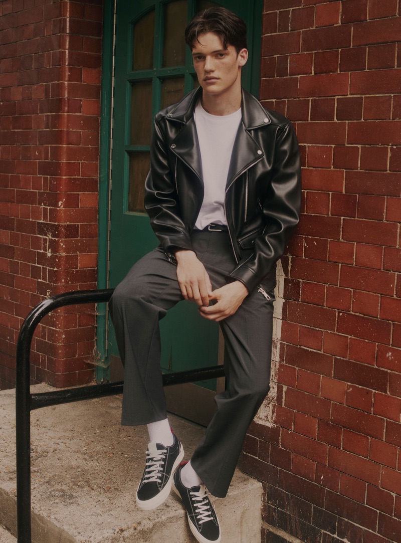 Joshua Hillman rocks a leather bike jacket and trousers from Zara.