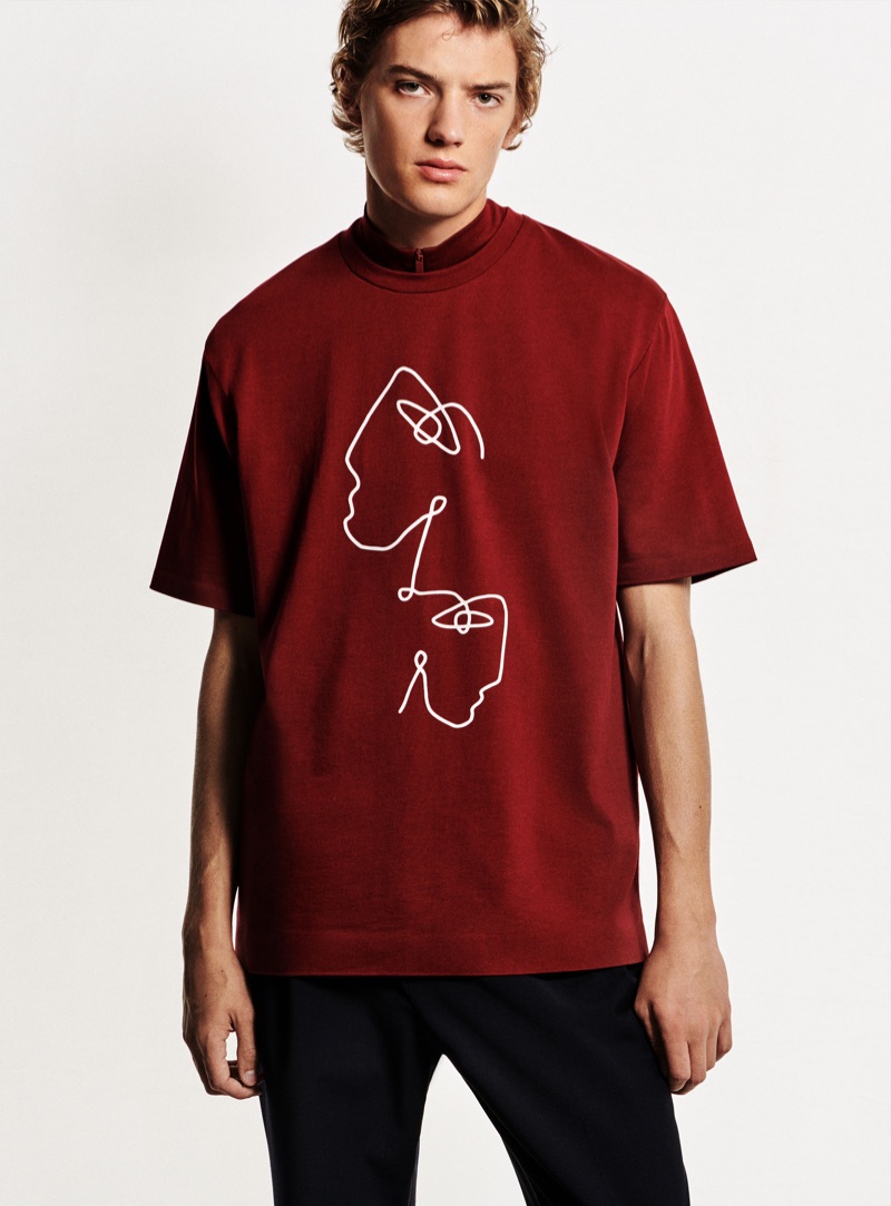 Theo Ford wears a graphic t-shirt from Zara's collaboration with illustrator James Wilson.