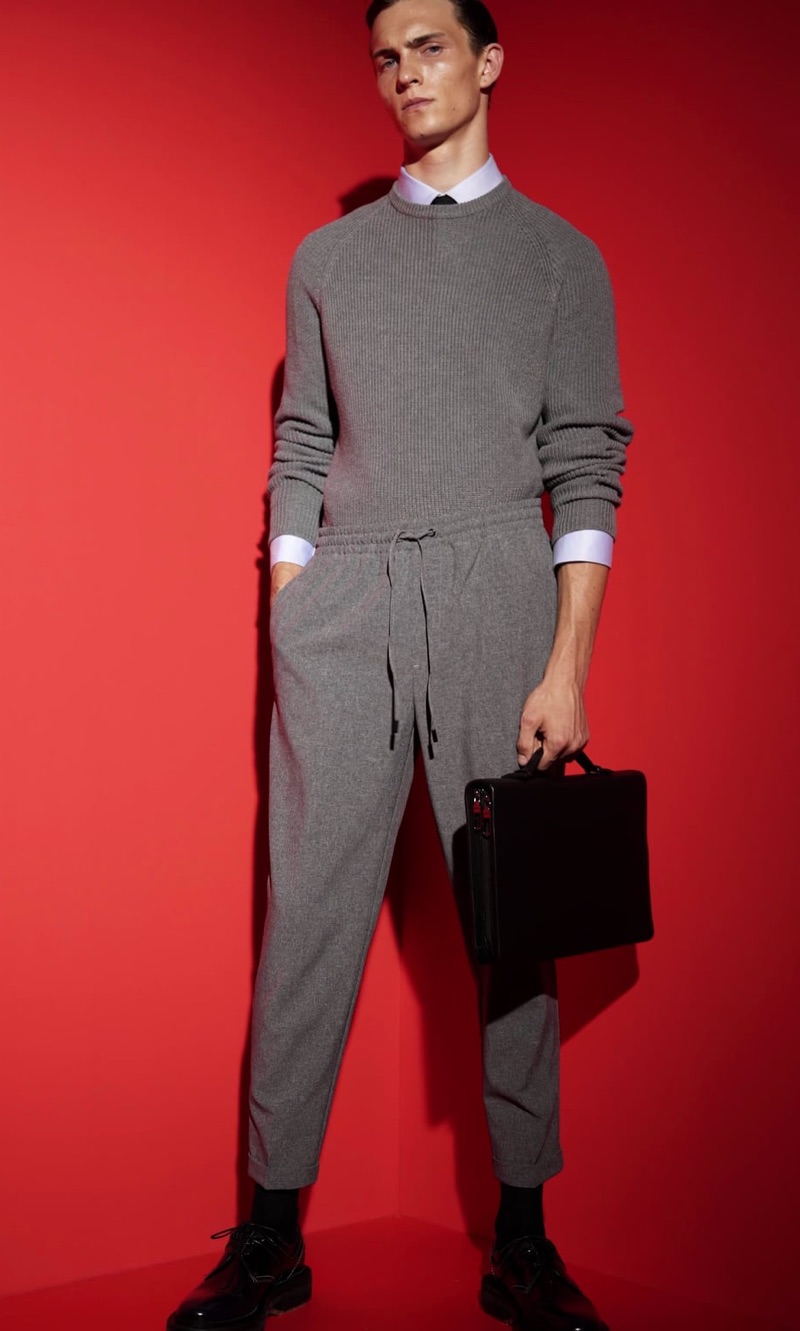 Embracing a monochromatic grey number, Luc Defont-Saviard wears a look from Zara Man's traveler collection.