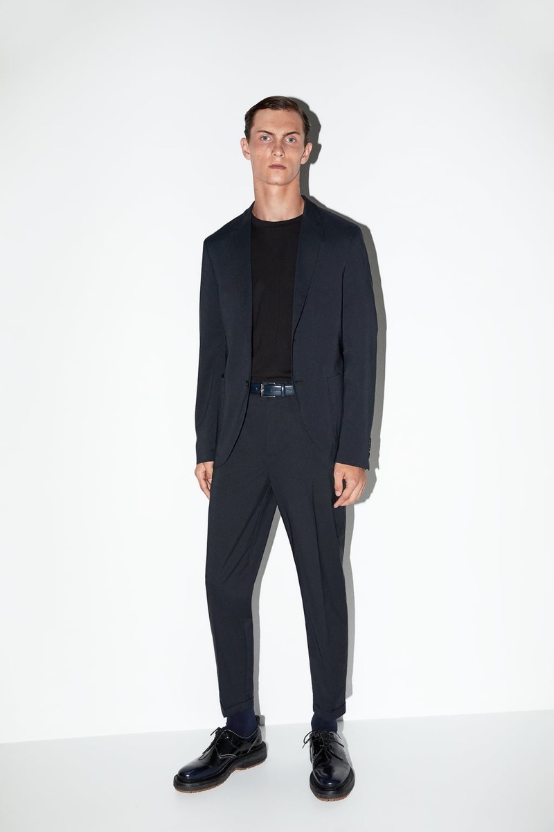 A smart vision, Luc Defont-Saviard dons a suit from Zara Man's traveler collection.