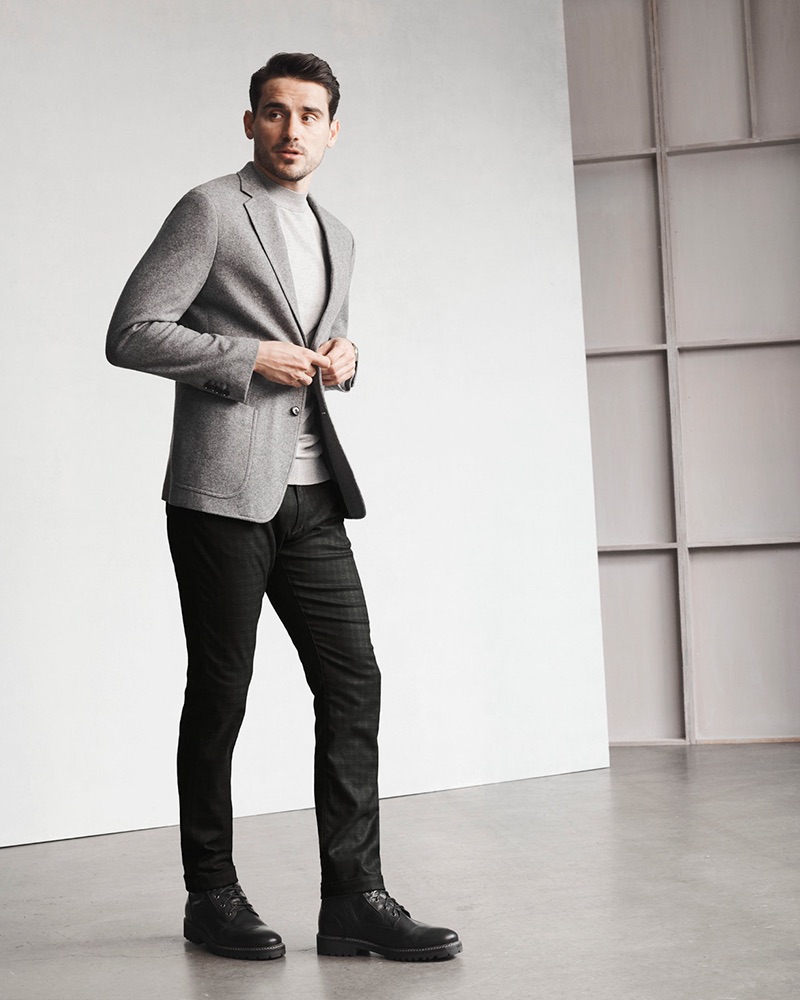 A smart vision, Arthur Kulkov rocks 34 Heritage's Courage mid-rise, straight leg black checked pants. 