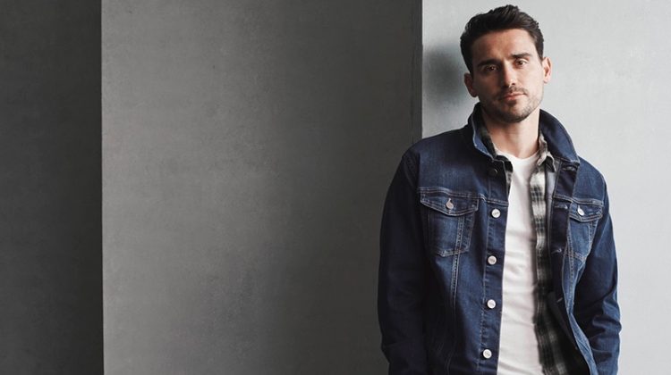 Top model Arthur Kulkov wears 34 Heritage's Travis denim jean jacket.