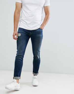 ASOS DESIGN 12.5oz skinny jeans with rips and abrasions in dark wash blue - Blue ASOS DESIGN 12.5oz skinny jeans with rips and abrasions in dark wash blue - Blue