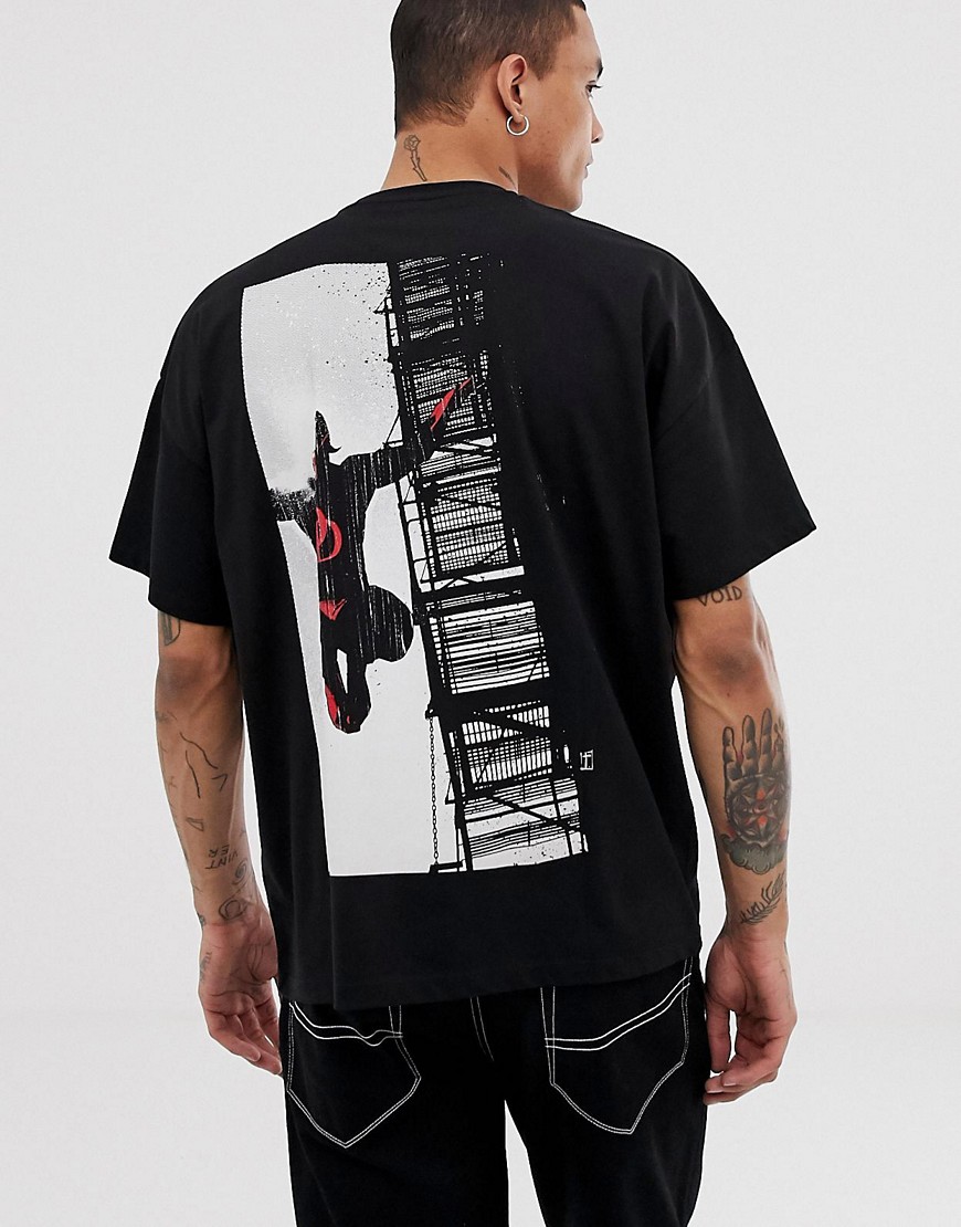 ASOS DESIGN oversized t-shirt with Marvel Noir Daredevil print – Black ...
