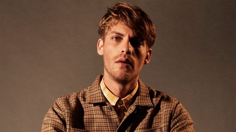 Front and center, Baptiste Radufe dons a checked overshirt with corduroy pants by Zara.