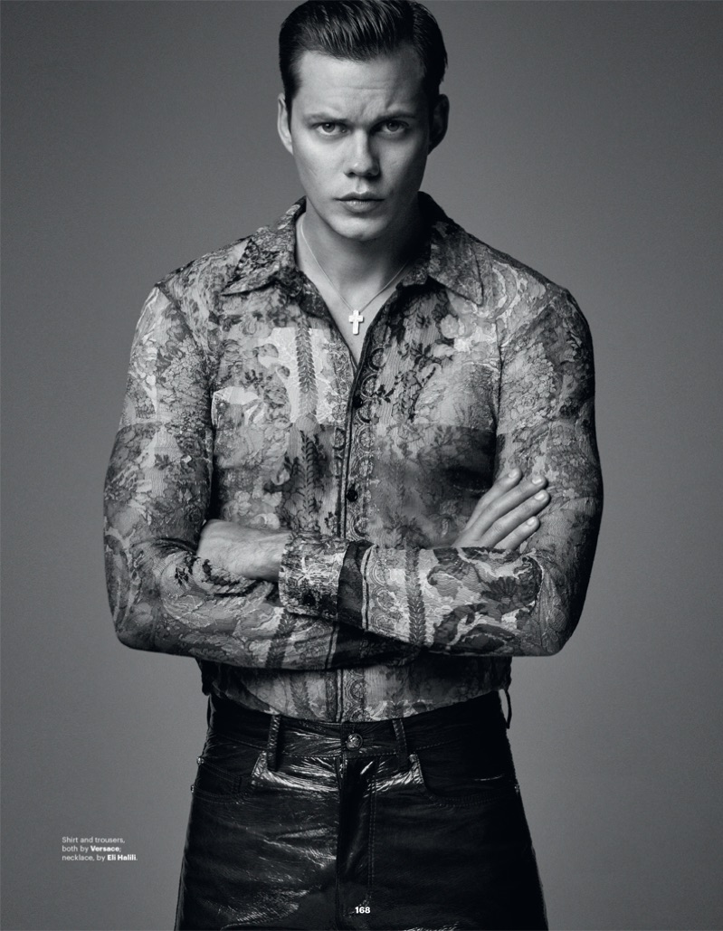 Front and center, Bill Skarsgård wears a shirt and pants by Versace.