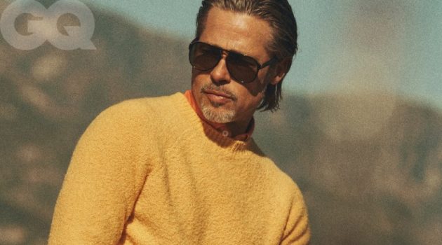 Brad Pitt Covers GQ, Talks Aging & Religion Standing out in yellow, Brad Pitt dons a Holiday Boileau sweater with a Boglioli shirt. Pitt also rocks Levi's Authorized Vintage jeans with an Artemas Quibble belt, vintage Ray-Ban sunglasses, and a David Yurman ring.