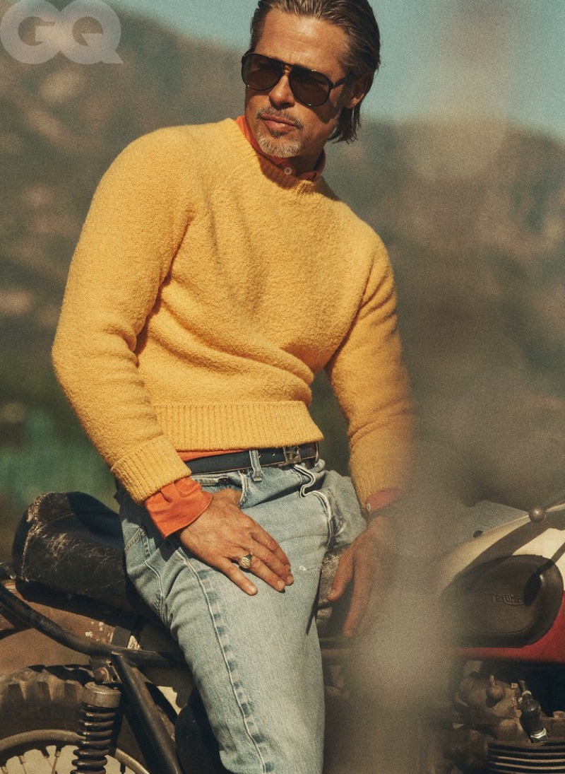 Standing out in yellow, Brad Pitt dons a Holiday Boileau sweater with a Boglioli shirt. Pitt also rocks Levi's Authorized Vintage jeans with an Artemas Quibble belt, vintage Ray-Ban sunglasses, and a David Yurman ring. » Brad Pitt Covers GQ, Talks Aging & Religion Standing out in yellow, Brad Pitt dons a Holiday Boileau sweater with a Boglioli shirt. Pitt also rocks Levi's Authorized Vintage jeans with an Artemas Quibble belt, vintage Ray-Ban sunglasses, and a David Yurman ring.
