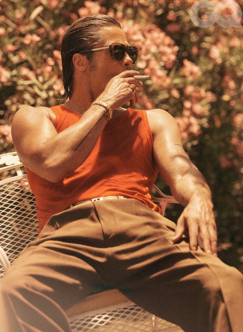 Brad Pitt rocks a Stock Vintage tank with Gucci pants, an Artemas Quibble belt, and Jacques Marie Mage sunglasses. » Brad Pitt Covers GQ, Talks Aging & Religion Brad Pitt rocks a Stock Vintage tank with Gucci pants, an Artemas Quibble belt, and Jacques Marie Mage sunglasses.
