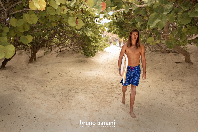 Taking to the beach, Travis Smith stars in Bruneo Banani's summer 2020 campaign.