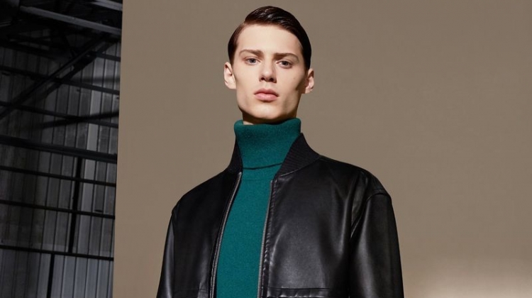 Conlan Munari dons a leather jacket and turtleneck sweater for CK Calvin Klein's fall-winter 2019 campaign.
