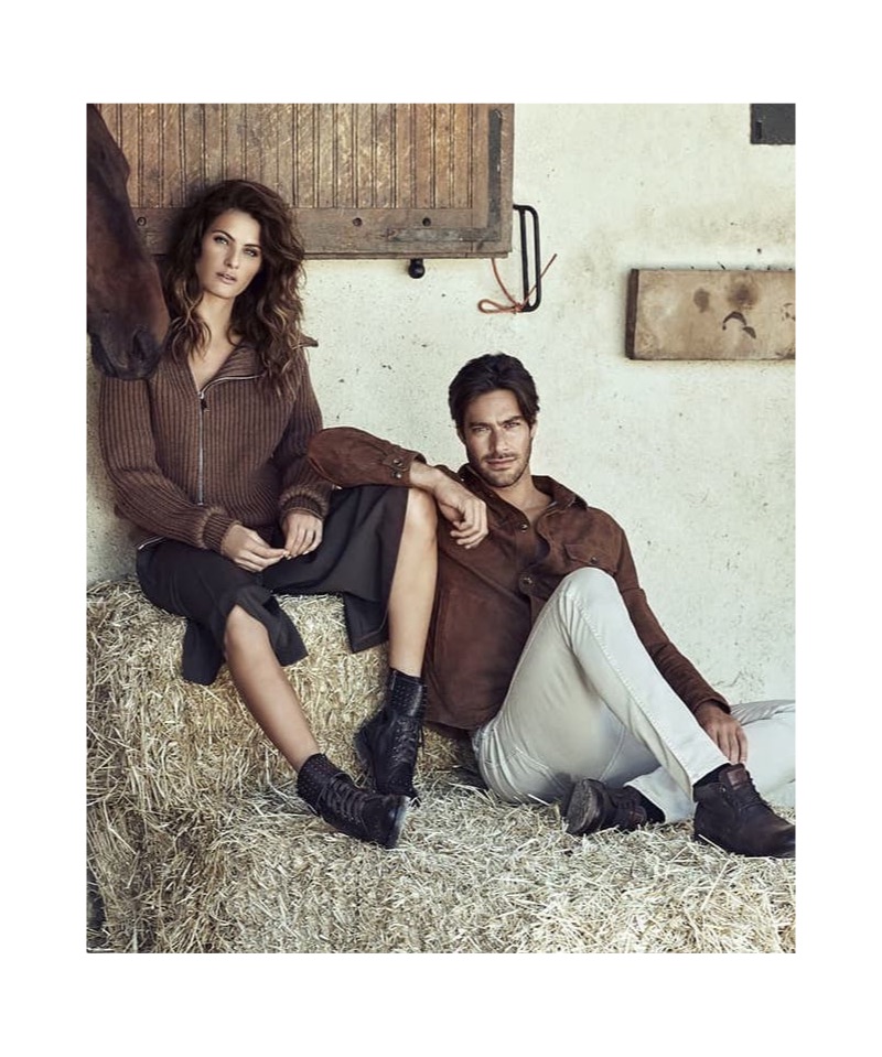 Donning a wardrobe with earth tones, Isabeli Fontana and Gonçalo Teixeira appear in Carmela Shoes' fall-winter 2019 campaign.