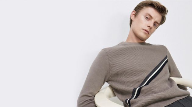 Janis Ancens Transitions Into Fall with Club Monaco Knitwear Janis Ancens sports a diagonal stripe sweater $149.50 from Club Monaco.