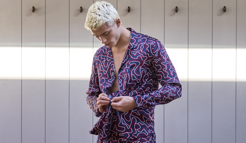 João Knorr models Derek Rose's modern fit pure silk pipe pajamas $1,000. 
