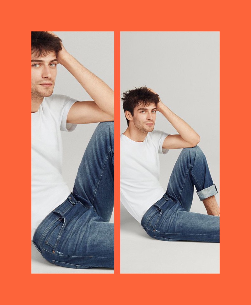 Matthew Bell sports distressed denim jeans by Esprit.