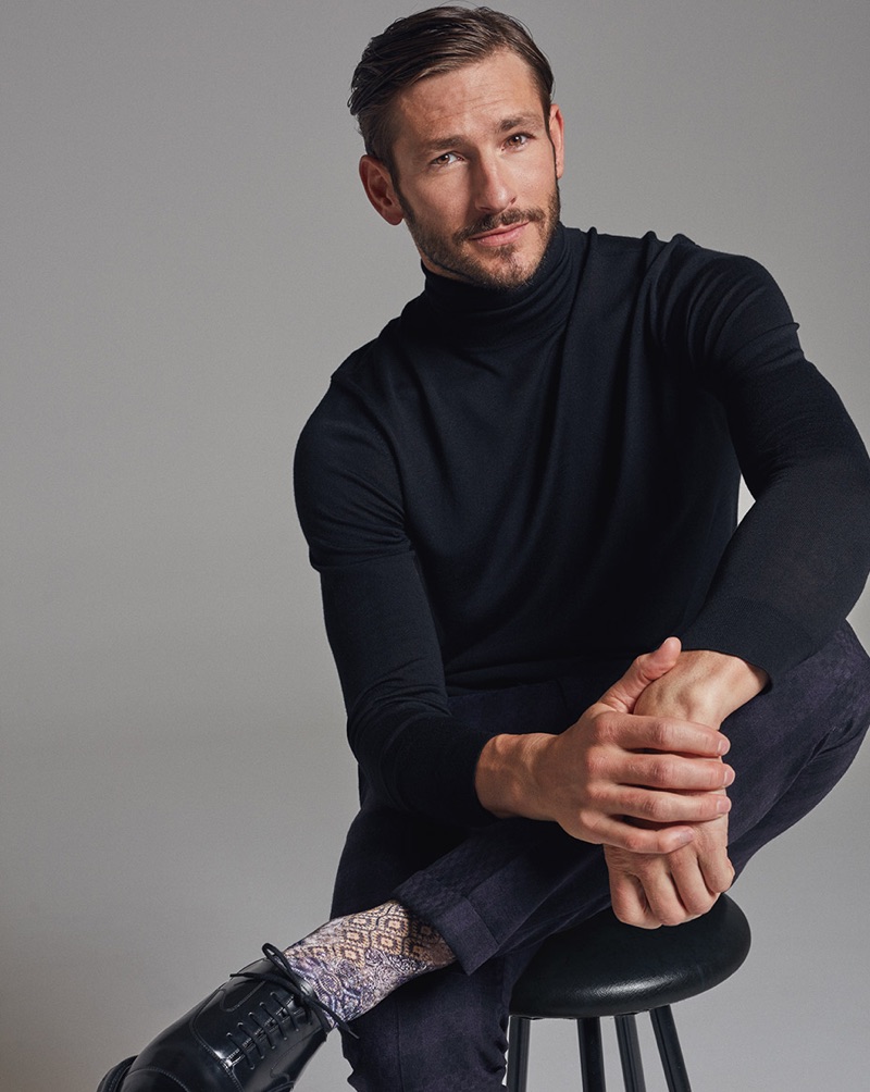 Front and center, Parker Gregory dons knitwear and socks by Falke.
