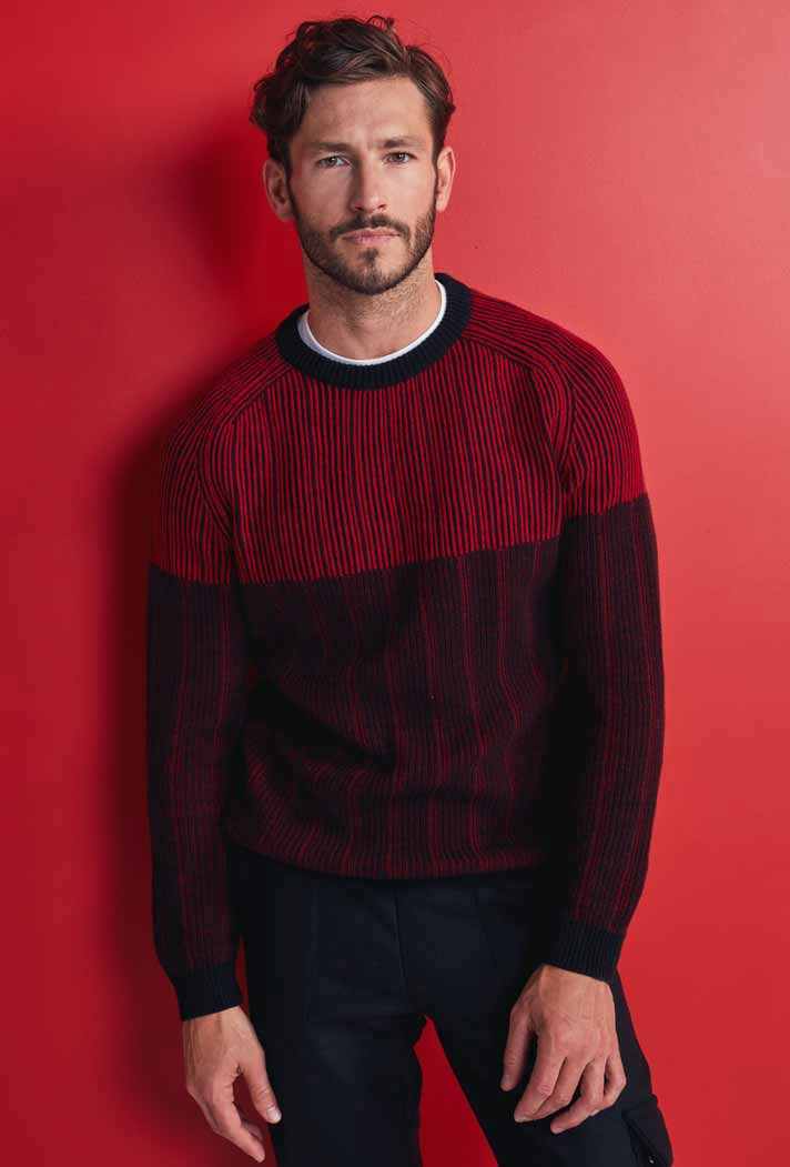 Model Parker Gregory sports a colorblock sweater from Falke's fall-winter 2019 collection.
