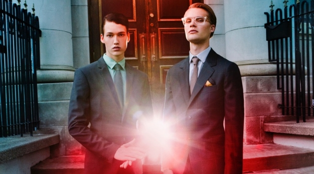 Tomer & Konrad in 'The Red Door' Left to Right: Tomer wears grey suit Marzotto from Simons, shirt Soul of London from Simons, tie Simons, shoes Moyer, and watch Michael Kors. Konrad wears suit Paul Smith, shirt Oskar Makinen from Simons, tie SImons, shoes Moyer, and glasses Etnia Barcelona from Eyes on Church Optical.