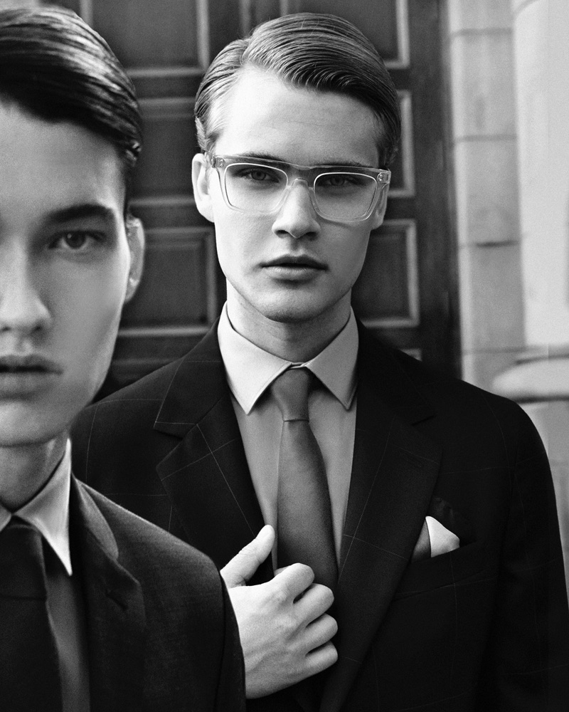 Left to Right: Tomer wears suit Marzotto from Simons, shirt Soul of London from Simons, and tie Simons. Konrad wears suit Paul Smith, shirt Oskar Makinen from Simons, tie Simons, and glasses Etnia Barcelona.