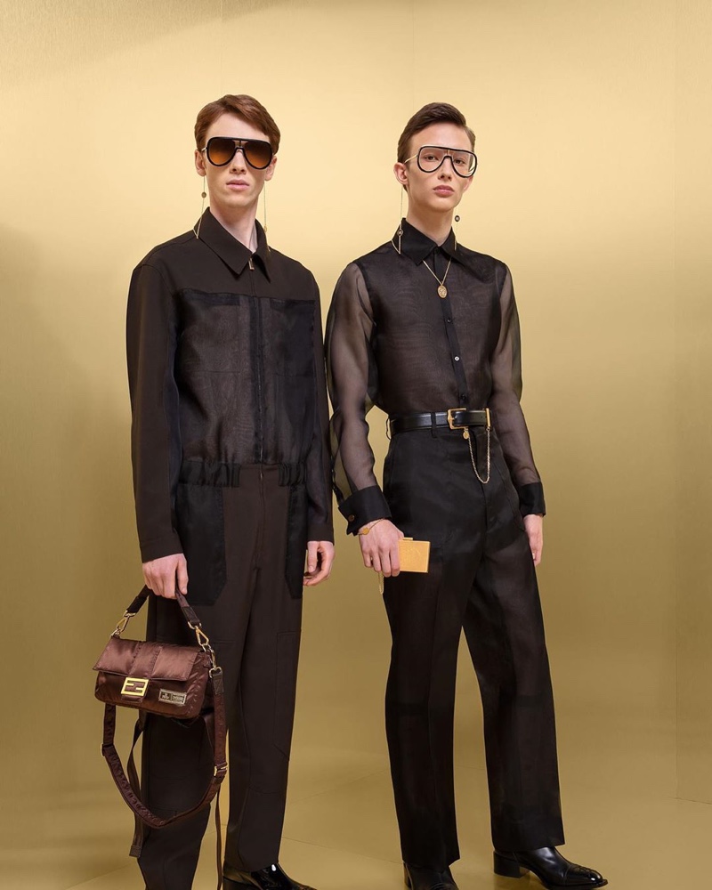 William de Courcy and Mateusz Chmielewski don sheer black looks from Fendi's fall-winter 2019 collection.