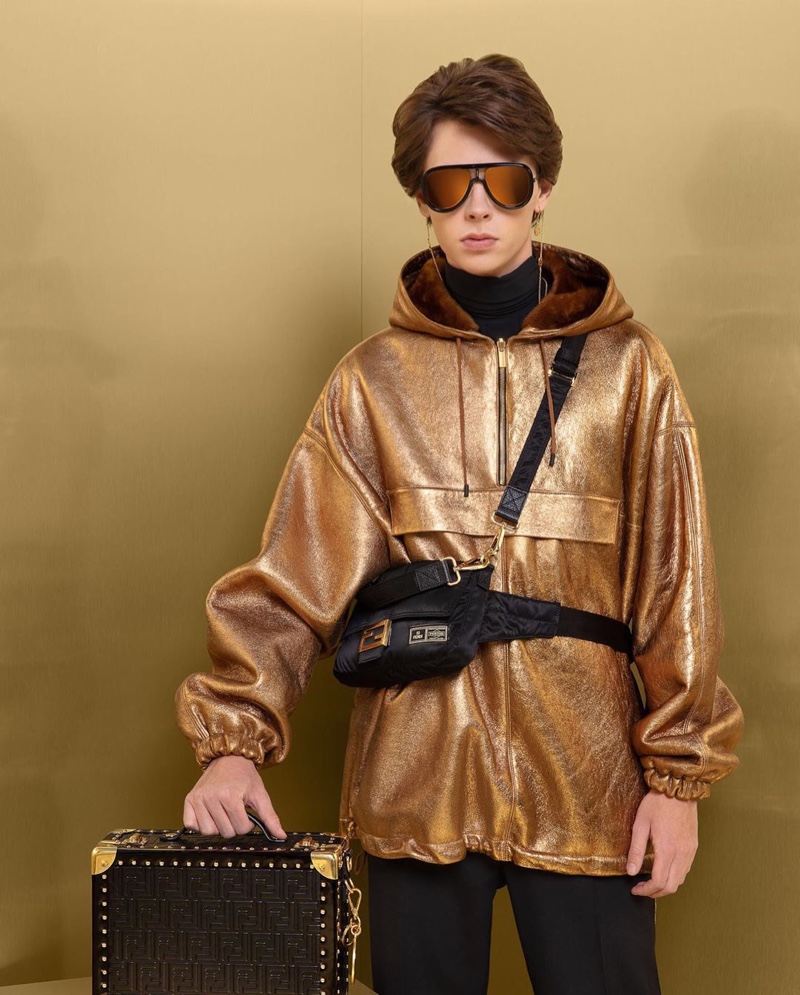 Paul Manniez shines in a gold anorak from Fendi's fall-winter 2019 collection.