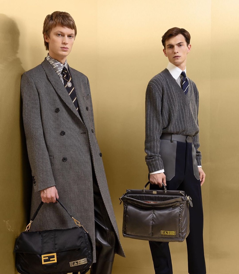 Jonas Glöer and Luc Defont-Saviard sport grey looks from Fendi's fall-winter 2019 collection.