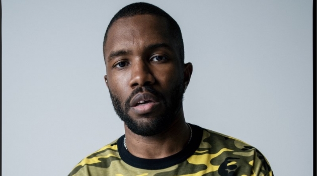 Frank Ocean Covers W Magazine, Talks New Music Themes Front and center, Frank Ocean wears his own camouflage print t-shirt with a Louis Vuitton shorts skirt and vintage belt.